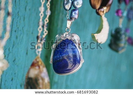 Blue Lapis Lazuli pendant Royalty-Free Stock Photo #681693082