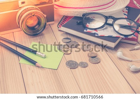 Close up of preparing traveler's accessories to travel vacation items, travel concept background. Journey and travel concept.