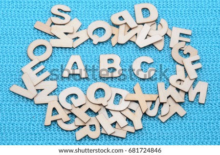 wooden letters on a blue underground photo