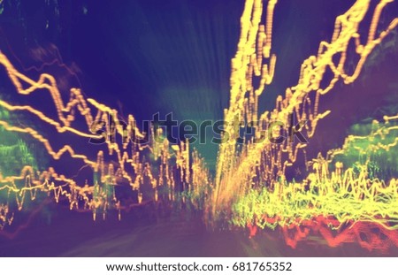Blurred Defocused Lights of Traffic, on the road at night