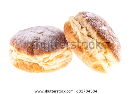 a traditional german krapfen isolated over a white background