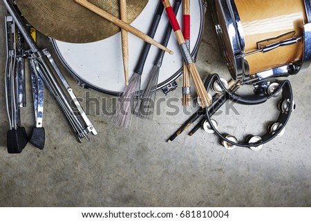 a pile of drum equipment