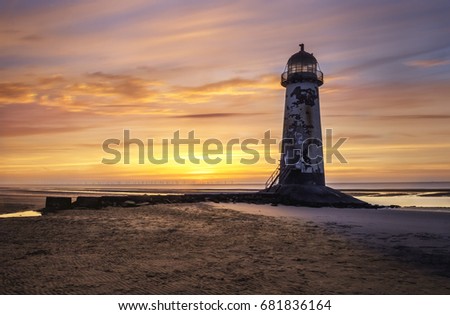 Point of Ayr Lighthouse on Talacre Beach, Wales Royalty-Free Stock Photo #681836164