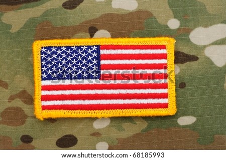 US flag patch on multicam camo background