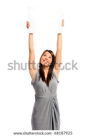 Attractive young woman holds an empty white board for your message