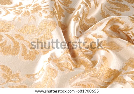 Texture, background, pattern. Fabric Upholstery Damask is a reversible figured fabric of silk, wool, linen, cotton, or synthetic fibres, with a pattern formed by weaving.