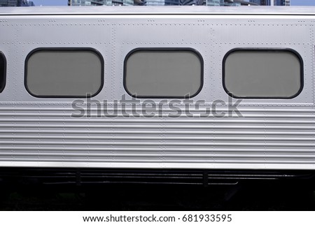 Subway Train Background / Texture - Silver Metal Train Wagon With Passenger Windows Royalty-Free Stock Photo #681933595