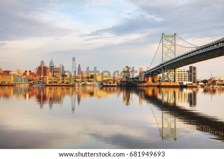 Philadelphia cityscape at sunrise with the Delaware river
