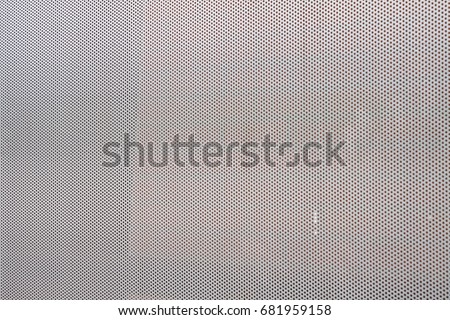 close up perforated sheet background