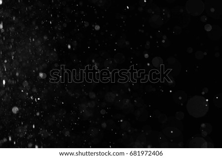 Abstract splashes of water on a black background         