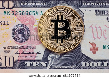Ten dollar bill with bitcoin covered face. Anonymous payment concept