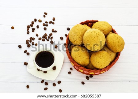 Honey biscuits with a cup of coffee. View from above.
