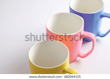 Colored mug isolated on white