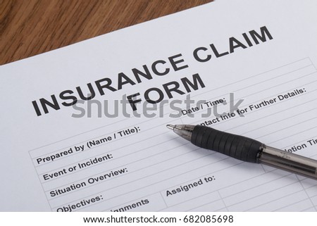 Filling out an insurance claim form