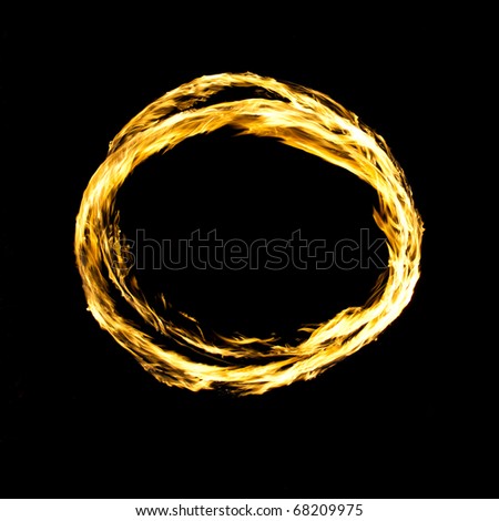 Fire circle isolated on black Royalty-Free Stock Photo #68209975
