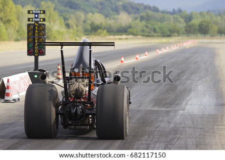 Dragster ready to start the race. Royalty-Free Stock Photo #682117150