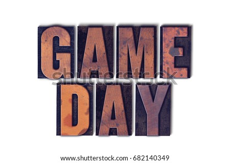 The words Game Day concept and theme written in vintage wooden letterpress type on a white background. Royalty-Free Stock Photo #682140349