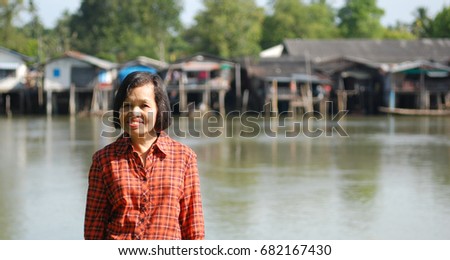 Happy senior woman portrait picture in sunshine day