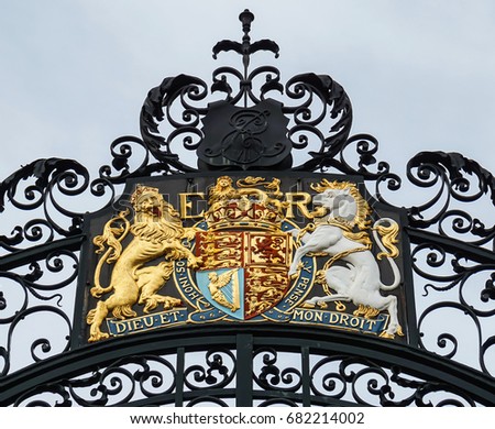 Royal Seal of the Lion and the Unicorn on an old gate in London UK.                               
