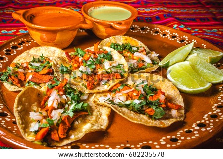 tacos al pastor in mexico city, mexican food Royalty-Free Stock Photo #682235578