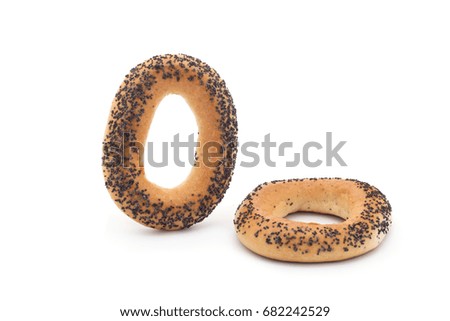 A delicious bagel with poppy seeds isolated on a white background