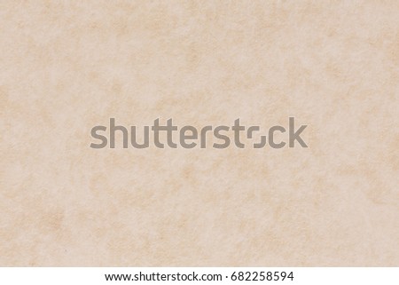 Close-up fragment of a brown filter paper texture. High resolution photo.