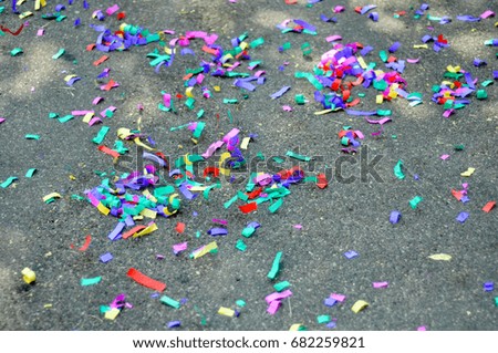 confetti colored stripes of paper thrown at party