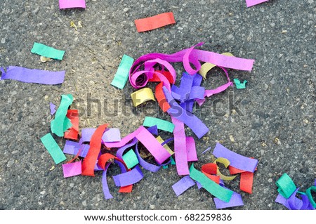 confetti colored stripes of paper thrown at party