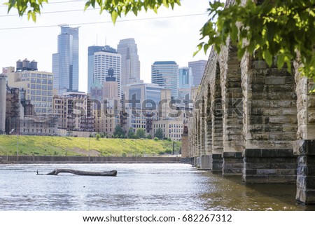 View of Minneapolis and Mississippi River seen from Stone Arch Bridge. 
