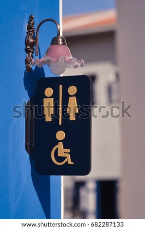 Restroom sign for Male, female and disabled