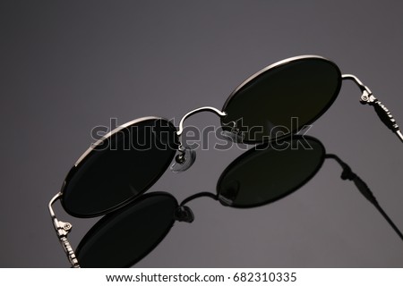 blue sunglasses in white background