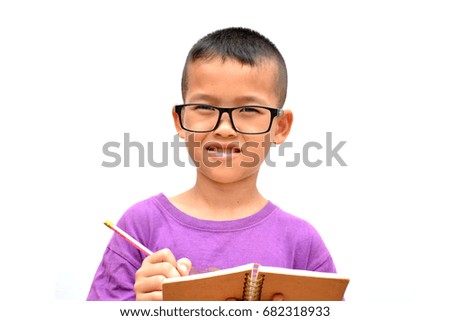 Asian boy writing a book On a white background
