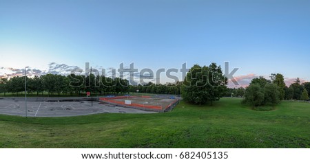Park 180 Panorama with Basketball Field and Red Vibrant Sunrise