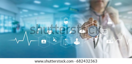 Medicine doctor and stethoscope in hand touching icon medical network connection   with modern virtual screen interface, medical technology network concept