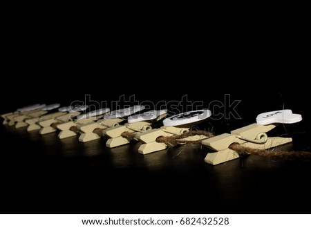 wood cloth pin on a black background