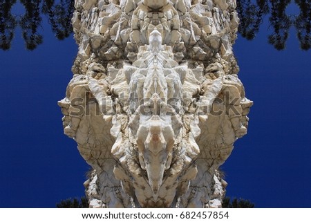Stone face of white quartz,symmetrical surreal photograph of a Mountains of white quartz, in the river Sor,  in Galicia,Spain, abstract naturalism, surrealism, surreal,magical picture, just for crazy 
