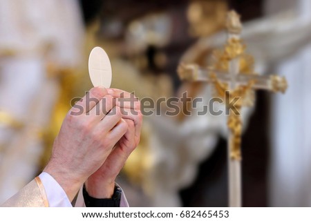 Priest celebrate mass at the church and empty place for text

 Royalty-Free Stock Photo #682465453