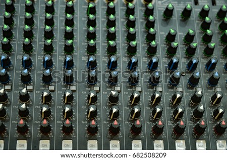 Selective focus professional audio mixing console panel.technology and entertainment concept