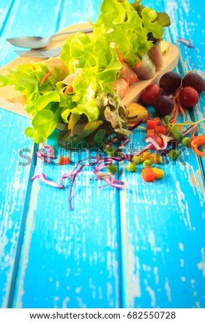 Healthy food salad Healthy, casual lifestyle of Healthy on the vintage blue wood background with copy space, Diet and fitness concept.