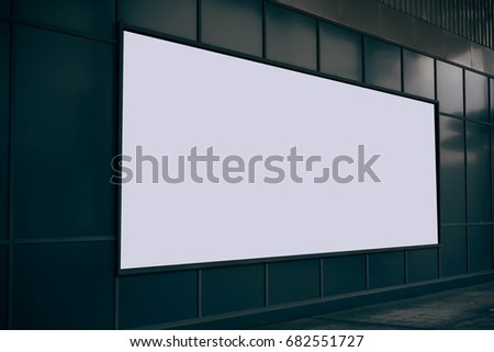 Blank billboard with empty copy space on the street in black tone