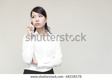 a portrait of young business woman talking by cellphohe