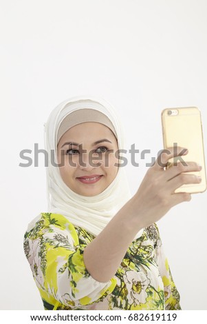 malay woman with tudung selfie