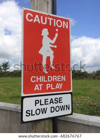 Road Sign Caution Children at Play Left
