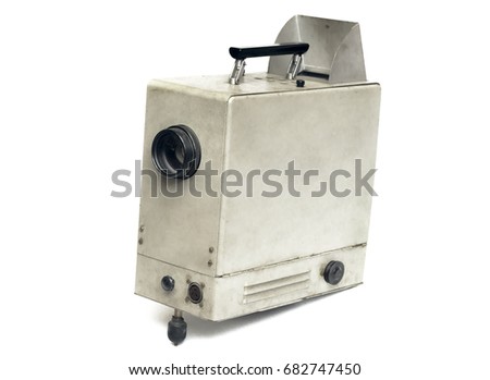 Old retro movie film projector isolated on white.