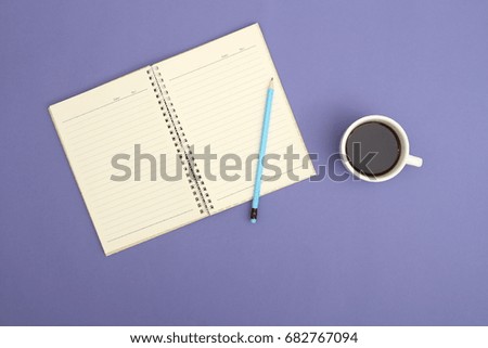 top view  office table with blank notebook