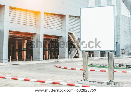 Vertical mock-up of city poster with thick edges, blank white billboard in urban settings,information placeholder on sidewalk with copy space for logo, advertising or your messages
