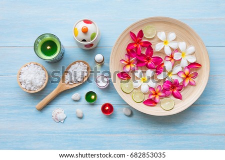 Spa set on blue rustic wooden board background, Beauty and fashion concept, top view , flat lay
