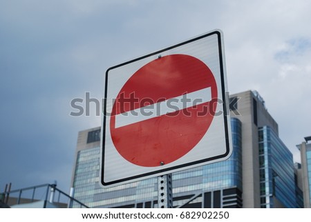 One Way / No Entry Signs On Street With Sky - City Road Red Symbol 