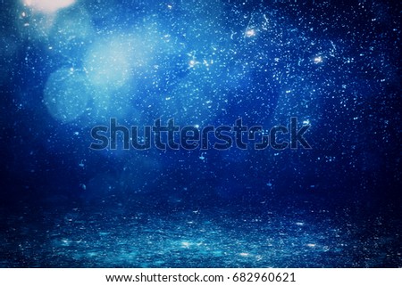 Abstract sparkly blue background/backdrop/texture/wallpaper
