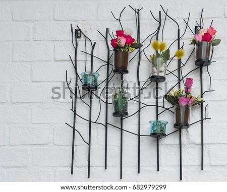 Flowers with white walls.